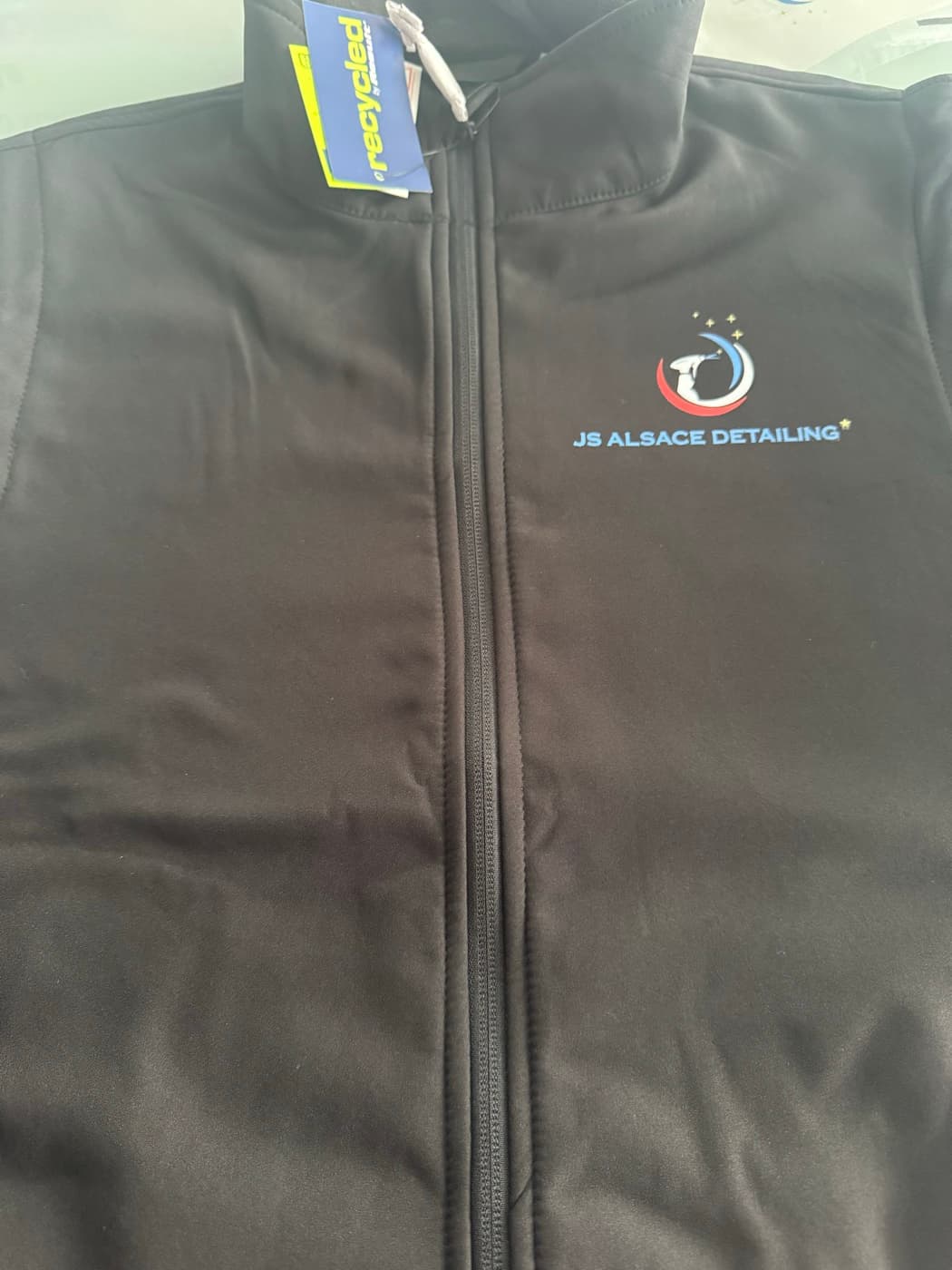 Veste softshell noire JS Alsace Detailing avec logo multicolore brodé